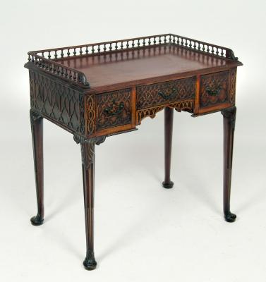 Appraisal: A CARVED MAHOGANY LOW BOY late th early th century