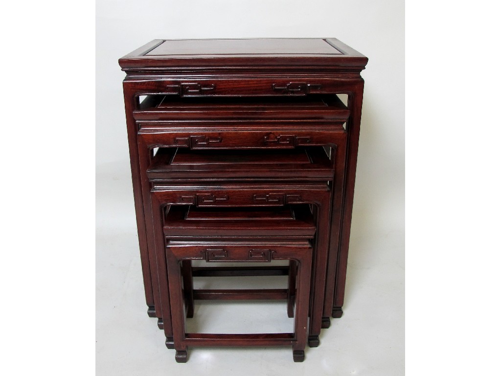 Appraisal: A Chinese style hardwood nest of four tables with carved