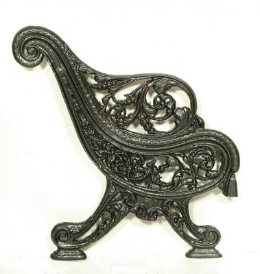 Appraisal: A PAIR OF VICTORIAN CAST IRON BENCH ENDS the scrolled