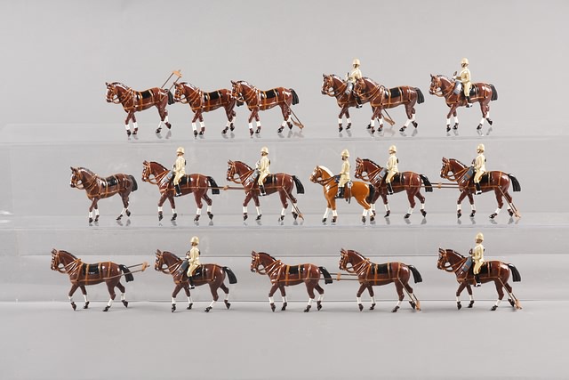 Appraisal: Lot of metal horses with riders complete with harnesses and