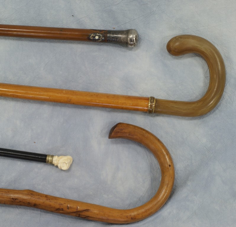 Appraisal: Walking sticks one plain one with horn handle marked Double