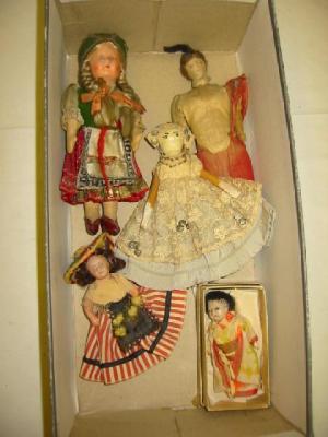 Appraisal: A bisque head dolls house doll with painted face brown