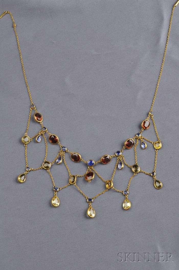 Appraisal: kt Gold Gem-set Festoon Necklace bezel-set with thirty-four fancy-shaped colored