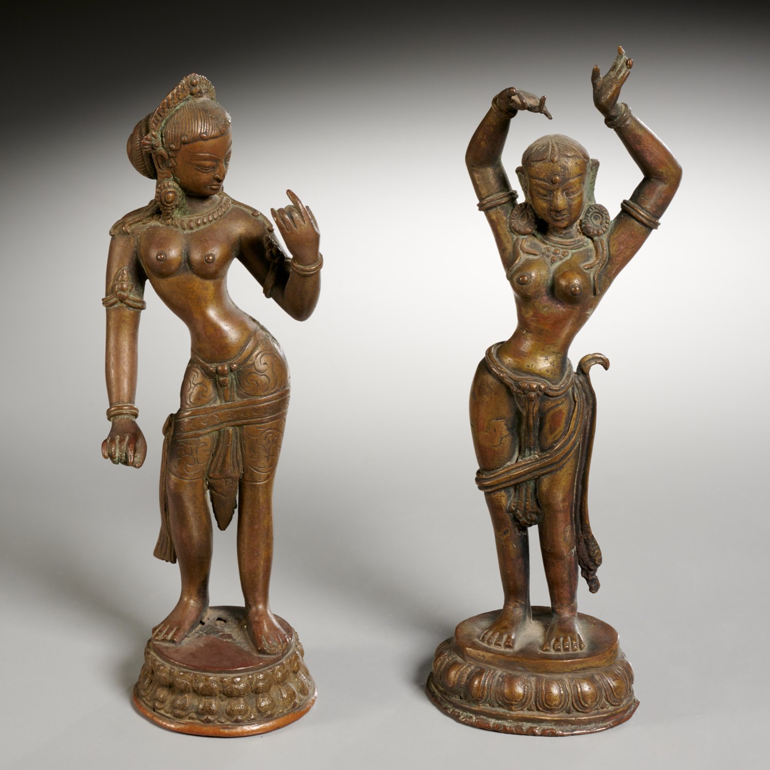 Appraisal: SOUTHEAST ASIAN BRONZE FIGURES OF PARVATI possibly th c brown