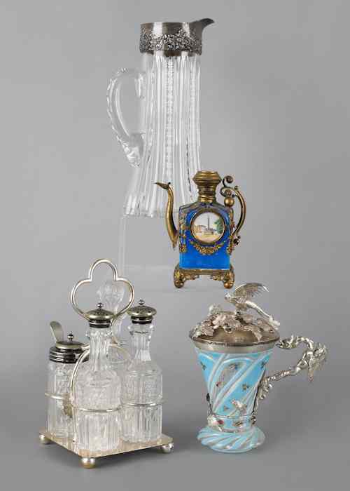 Appraisal: Silver mounted cut glass pitcher h together with a cruet