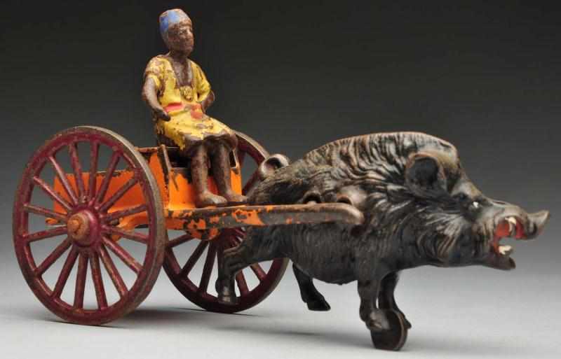 Appraisal: Cast Iron Kenton Wild Boar Cart Toy Description American All