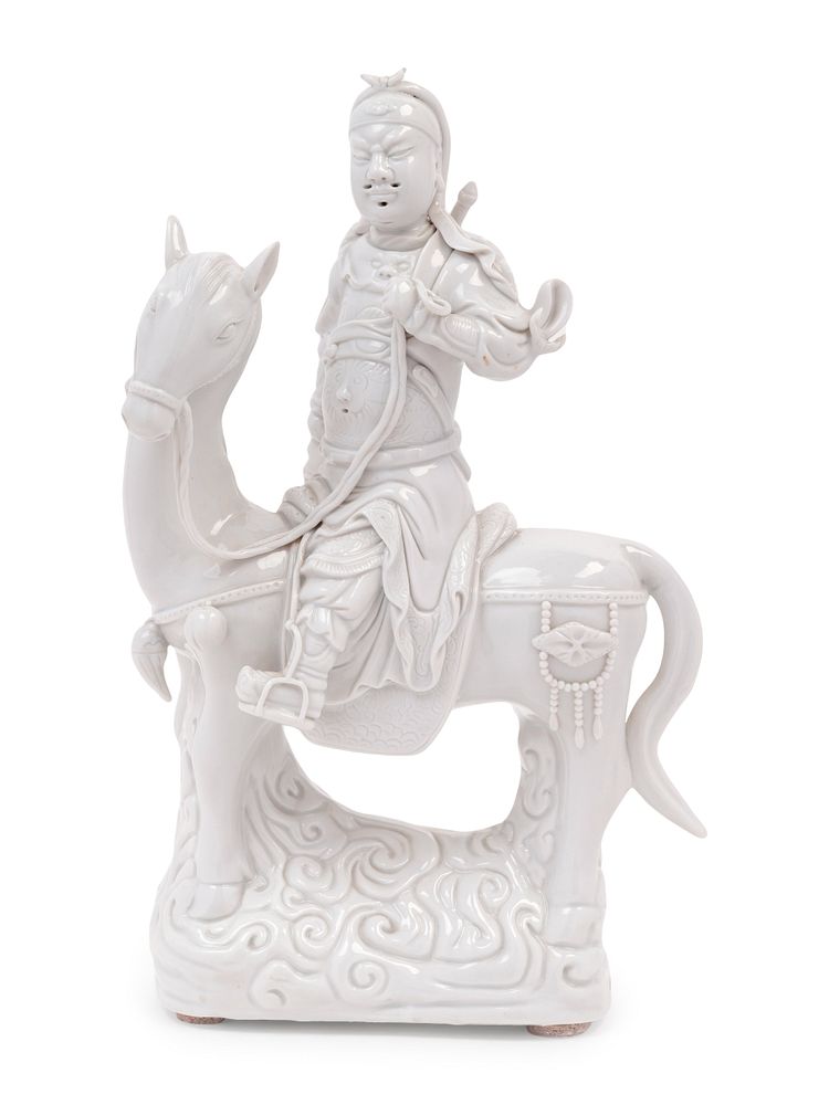 Appraisal: A Chinese Blanc-de-Chine Porcelain Figure of Guangong A Chinese Blanc-de-Chine