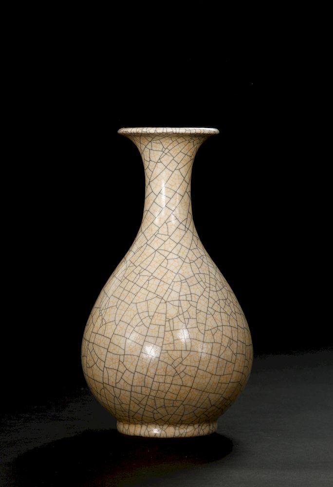 Appraisal: Crackled Glazed Yuhuchuan Vase Of pear-shaped globular body rising to