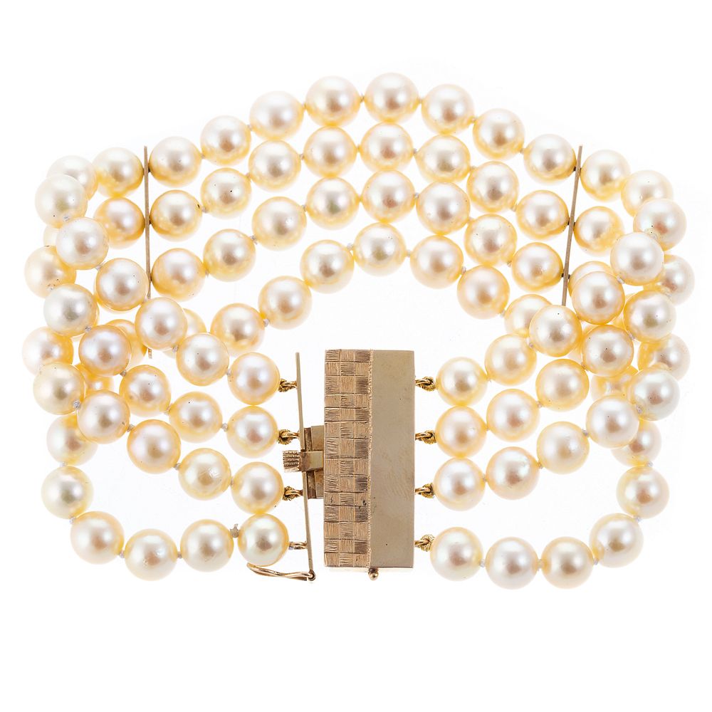 Appraisal: A Four Strand Golden Pearl Bracelet with K Clasp Four