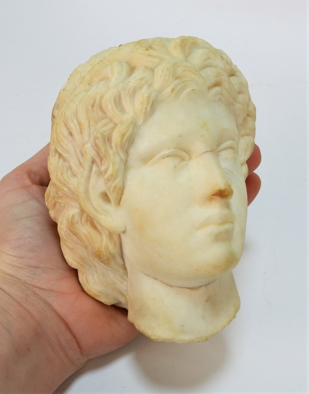 Appraisal: CLASSICAL GRECIAN CARVED MARBLE HEAD FRAGMENT GreeceClassical PeriodNaturalistic sculpt of