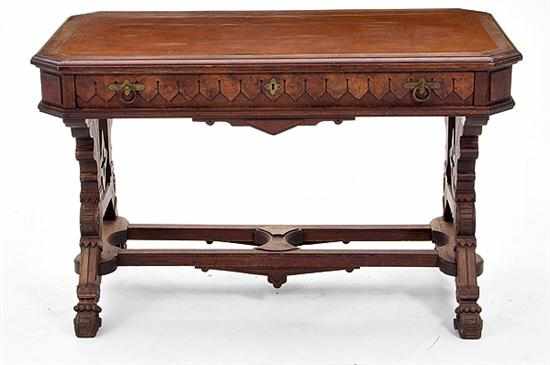 Appraisal: American Renaissance Revival walnut library table circa leather writing surface