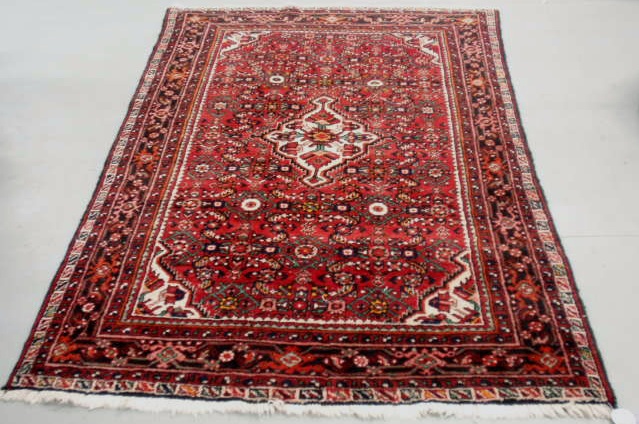 Appraisal: Oriental center hall carpet overall red floral patterns and center