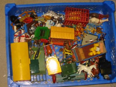 Appraisal: Various metal and plastic horse drawn vehicles figures and equipment