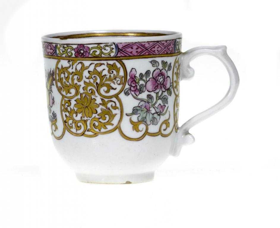 Appraisal: A DERBY COFFEE CUP with unusual S shaped handle with