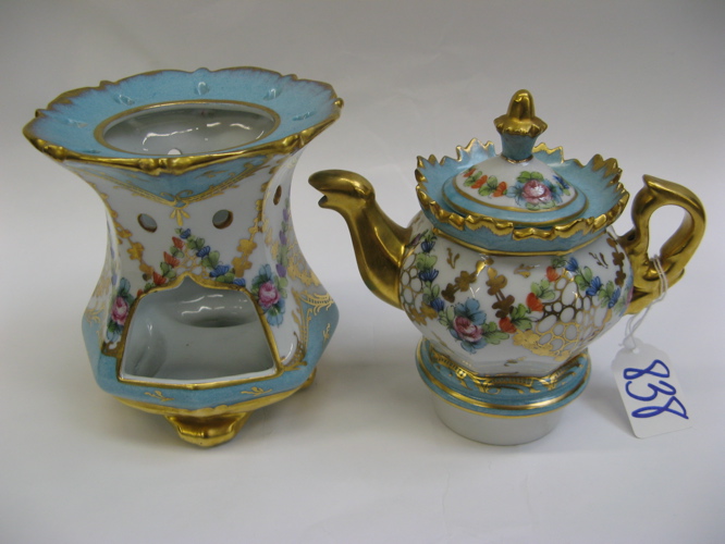 Appraisal: FRENCH TWO-PART PORCELAIN VEILLEUSE hand decorated with multi-colored floral and