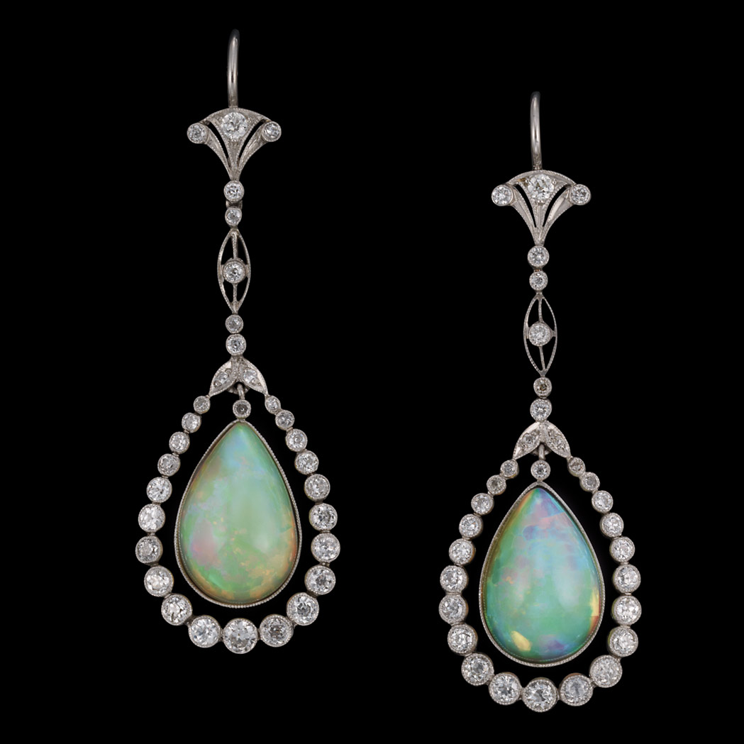 Appraisal: Pair of Platinum Opal and Diamond Pendant-Earrings Suspending pear-shaped opals