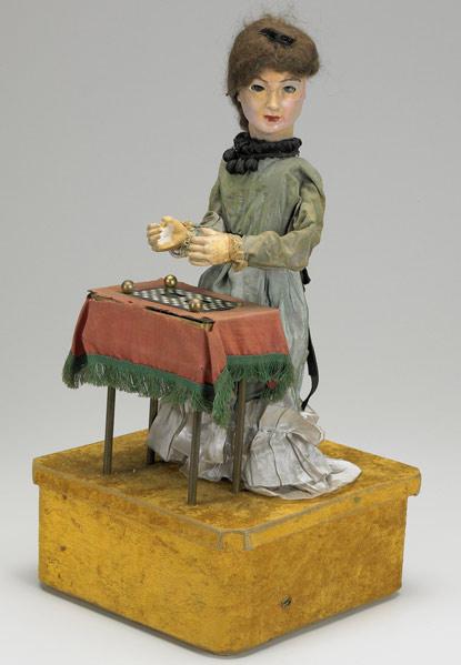 Appraisal: AUTOMATON The Magician probably French ca - Gypsy shell game