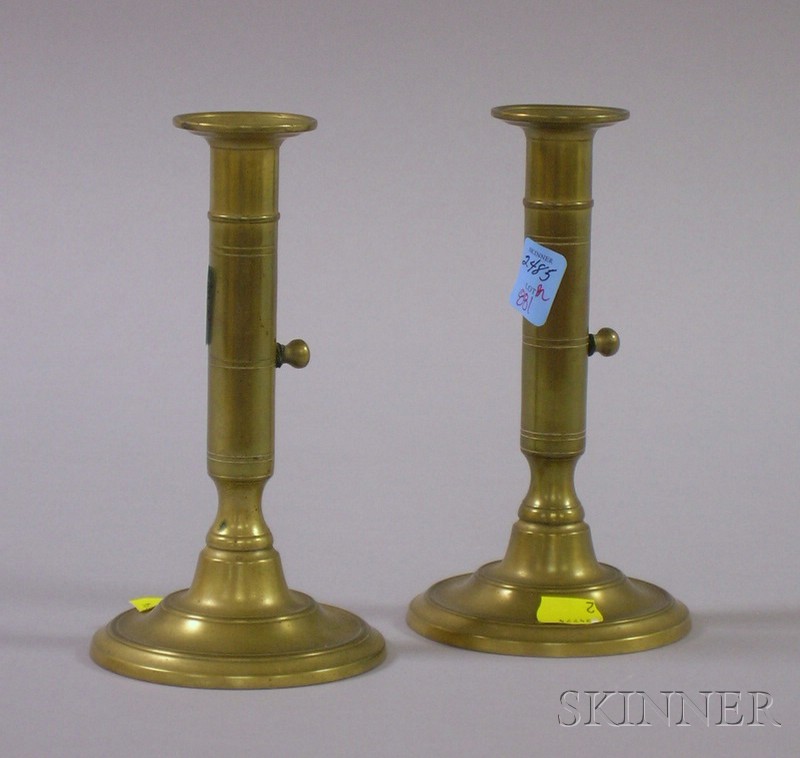 Appraisal: Pair of Federal Brass Round-base Push-up Candlesticks ht in