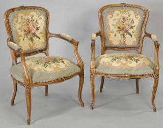 Appraisal: Pair of Louis XV style fauteuil with needlepoint seats and