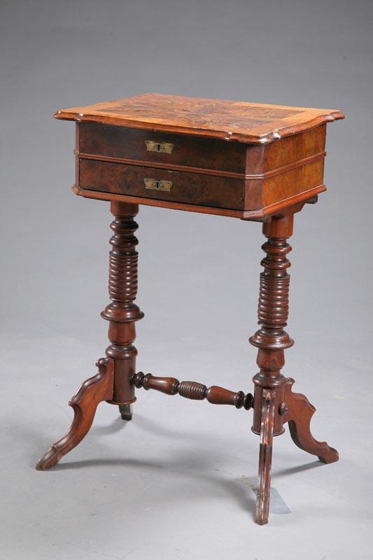 Appraisal: SEWING STAND Mahogany with a scalloped lift top revealing a