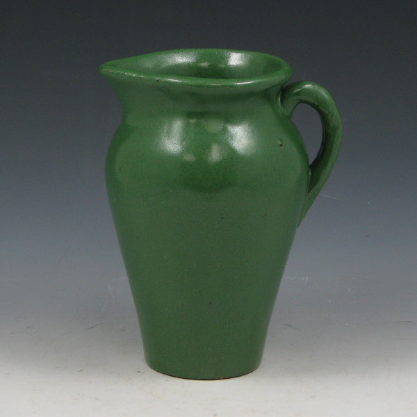 Appraisal: Semi-matte green pitcher marked Epi-CURIO S L P C N