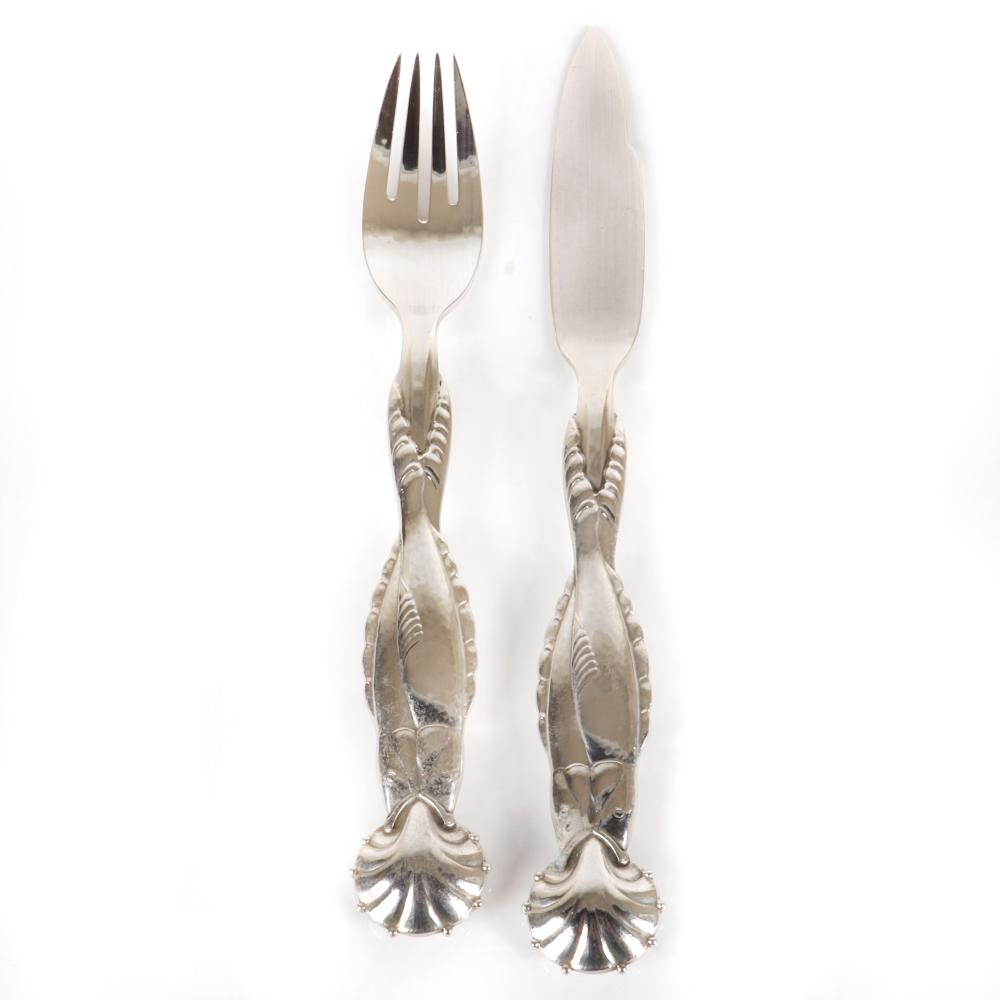 Appraisal: GEORG JENSEN DOLPHIN PATTERN STERLING SILVER FISH FORK AND KNIFE