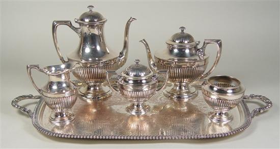 Appraisal: Silverplate Tea Service Ribbed urn shaped body and ribbed lids