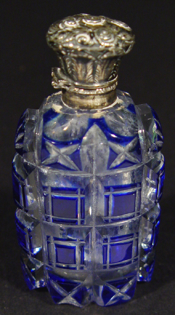 Appraisal: Blue flashed cut glass scent bottle with embossed silver metal