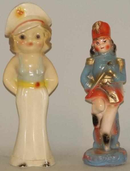 Appraisal: Lot of Figural Chalk Carnival Statues Both of Girls One