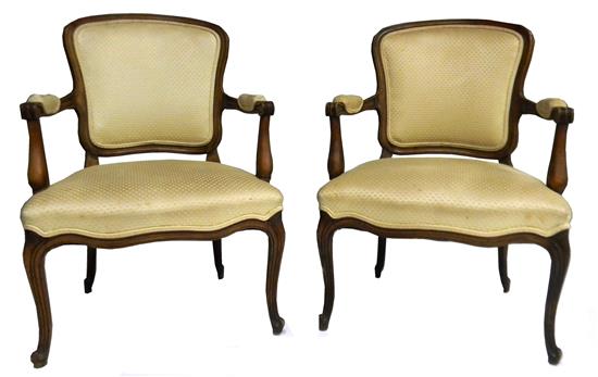 Appraisal: Pair th C French style open armchairs carved fruitwood frames