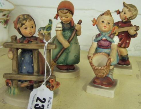 Appraisal: A group of four Hummel figures including Little Helper Little