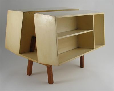 Appraisal: Penguin Donkey ' an Isokon cherrywood book rack designed by