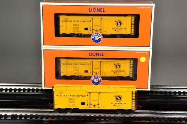 Appraisal: LIONEL FREIGHT CARSThree identical Great Northern Steel-sided Reefer die-cast opening