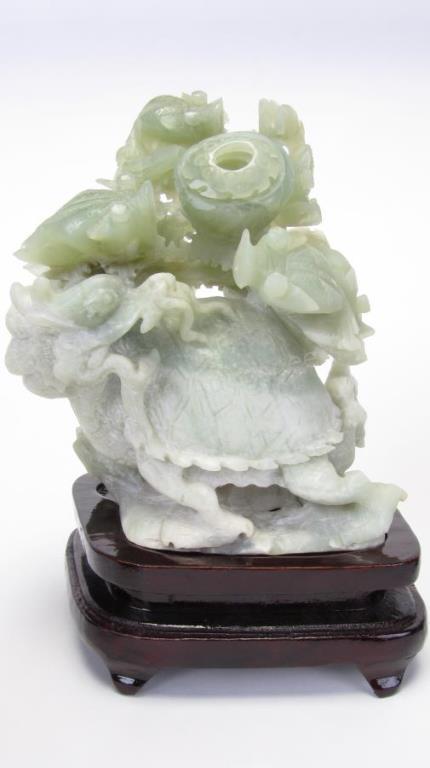 Appraisal: Oriental Carved Jade Sculpture green and white jade carving with