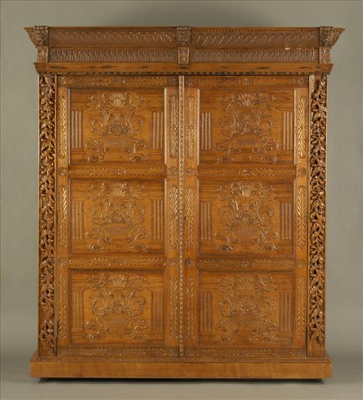 Appraisal: A Belgian oak armoire late th century enclosed by a