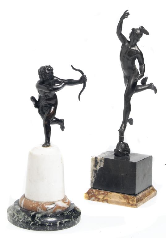 Appraisal: A BRONZE STATUETTE OF CUPID FIRING AN ARROW black patina