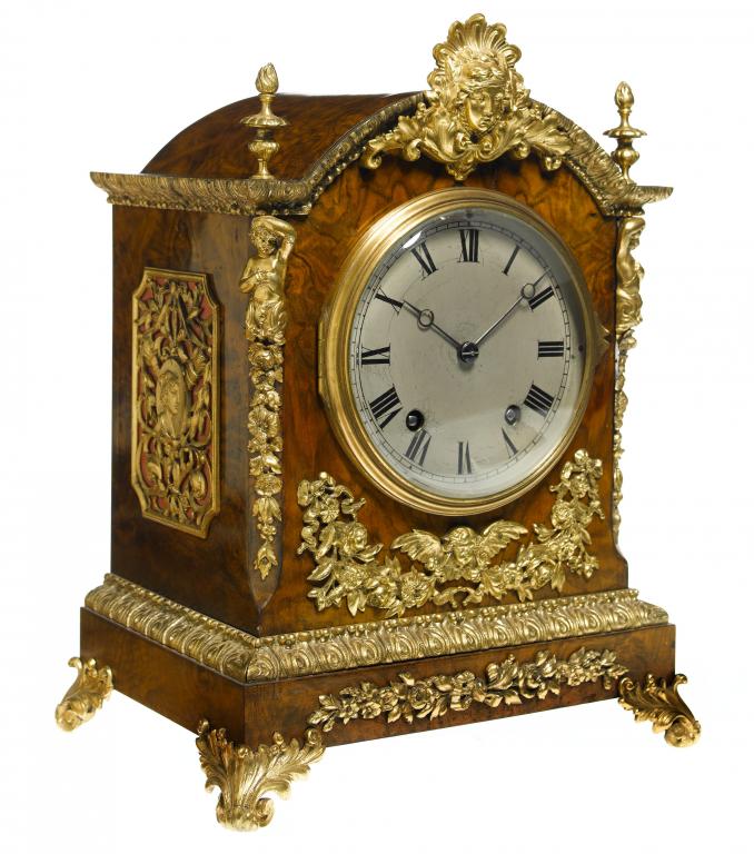 Appraisal: A GERMAN GILTMETAL-MOUNTED WALNUT BRACKET CLOCK the silvered dial with