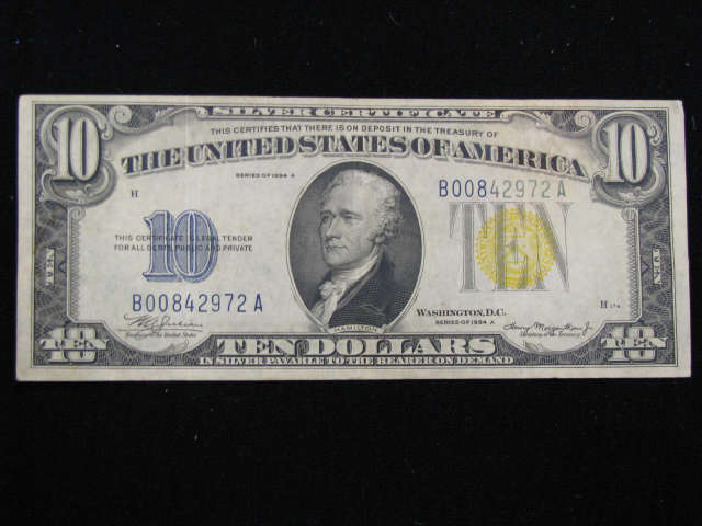 Appraisal: -A Silver Certificate color run on reverse XF