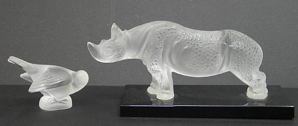 Appraisal: A Lalique frosted glass figure of rhinoceros and a sparrow