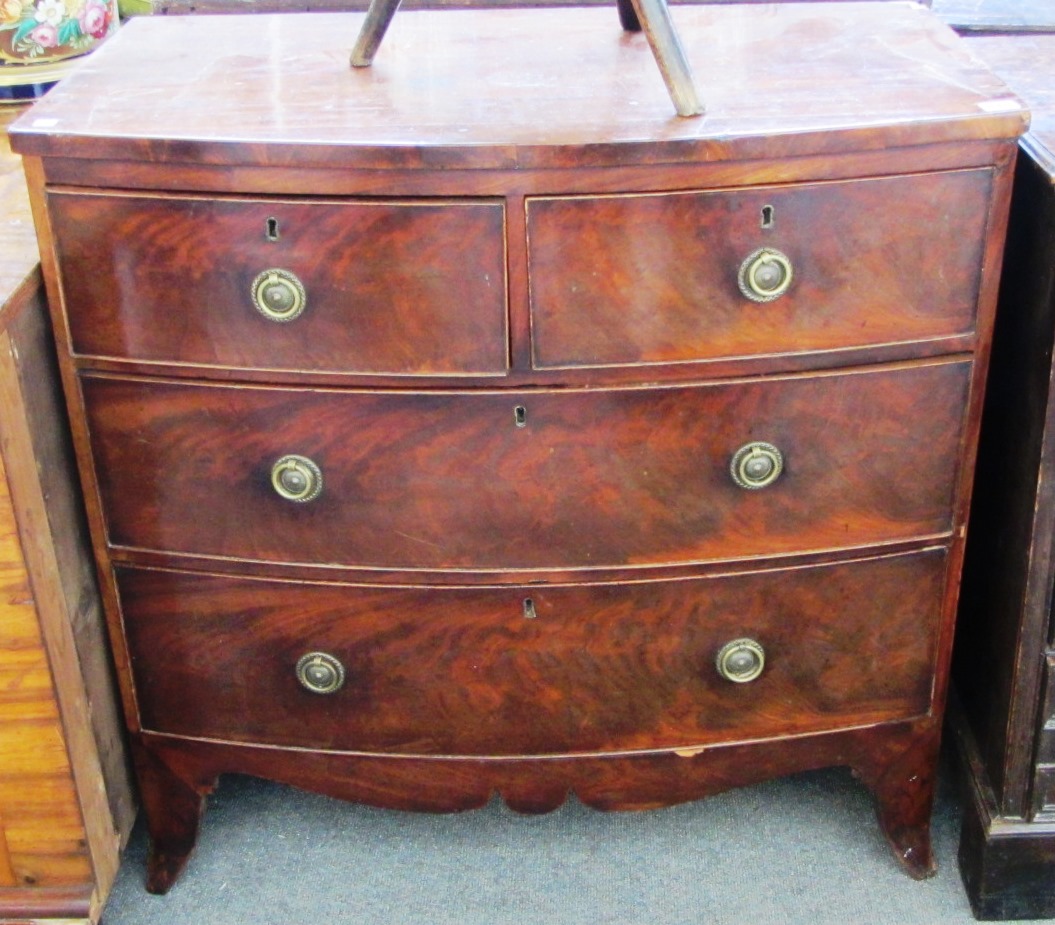 Appraisal: An early th century mahogany bowfront chest of two short