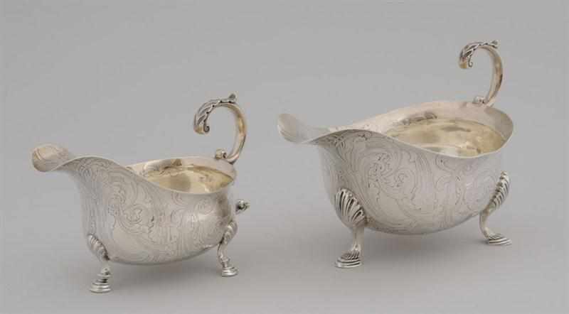 Appraisal: PAIR OF TIFFANY CO ENGRAVED SILVER GRADUATED SAUCE BOATS -