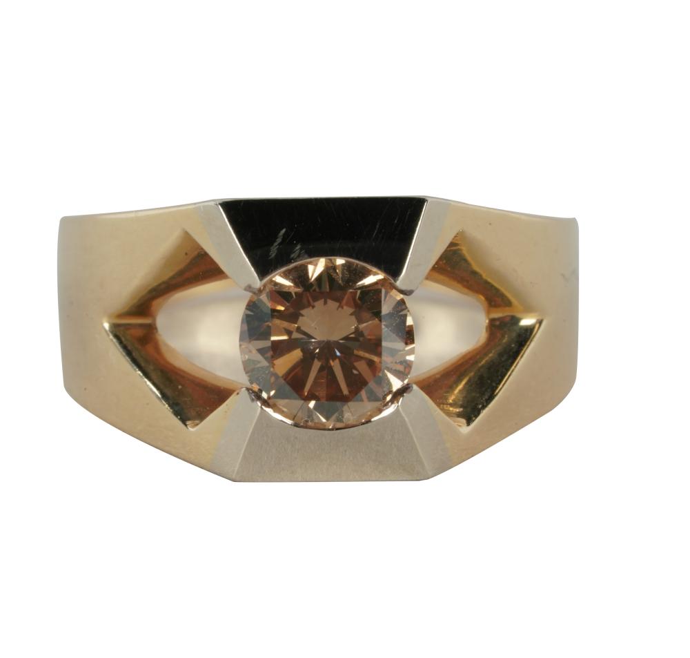 Appraisal: KARAT YELLOW GOLD BROWN DIAMOND RINGcentering one round brilliant cut