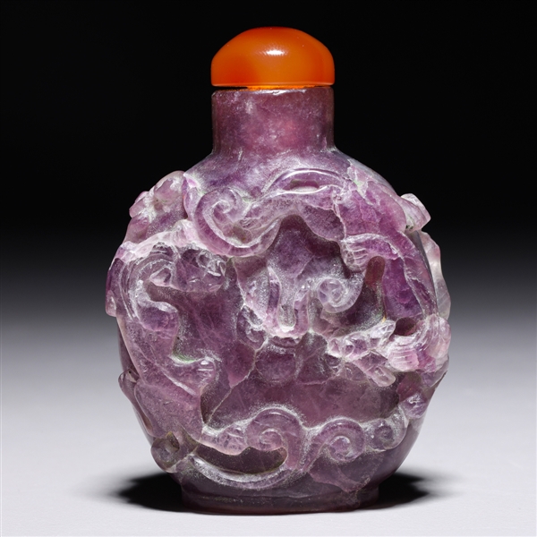 Appraisal: Large Chinese carved purple fluorite snuff bottle with qilong and