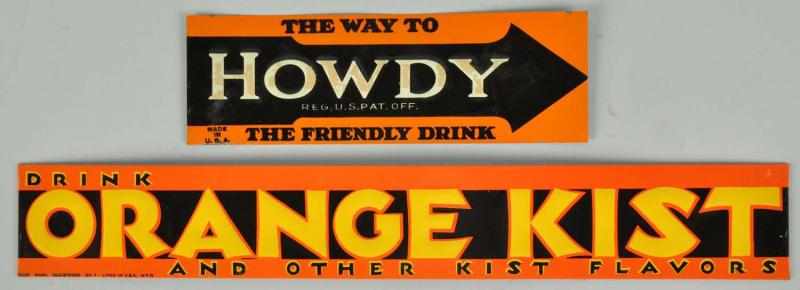 Appraisal: Tin Orange Kist Howdy Strip Signs Description s Both are