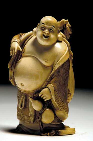 Appraisal: CARVED IVORY OKIMONO HOTEI Well carved and detailed ivory okimono