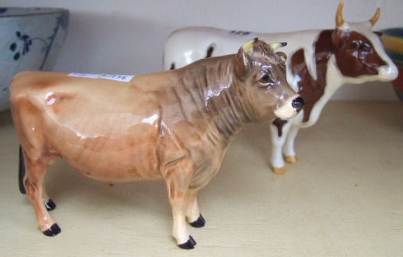 Appraisal: A Beswick Jersey Bull Dunsley Coy Boy and another of