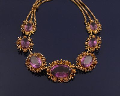 Appraisal: An early Victorian amethyst necklace The seven graduated oval shaped