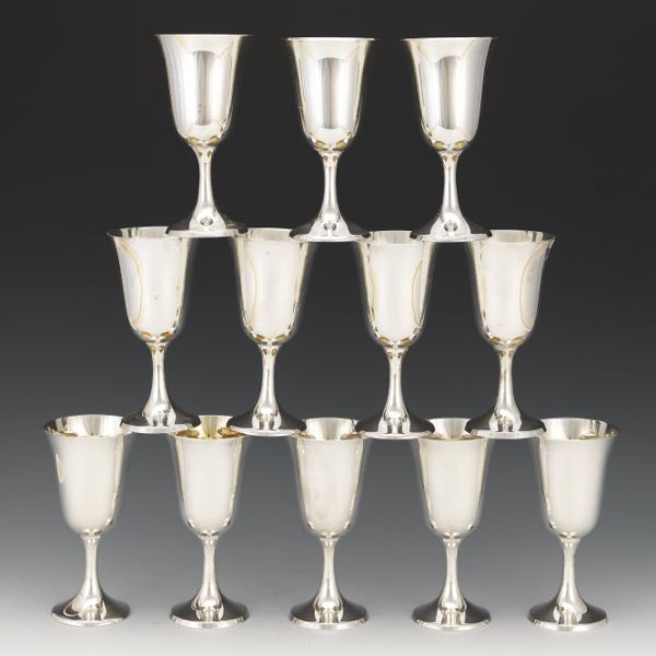 Appraisal: TWELVE MANCHESTER STERLING SILVER WINE GLASSES x Tulip form sterling