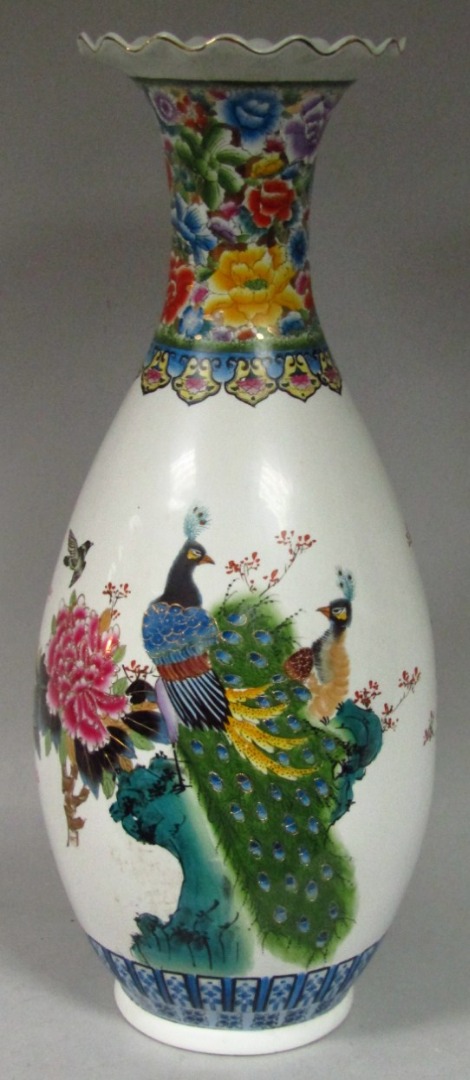 Appraisal: A modern Chinese design vase the flared rim raised above