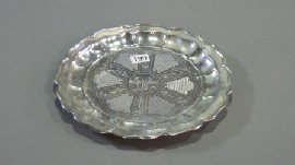 Appraisal: A circular shallow dish with engraved decoration